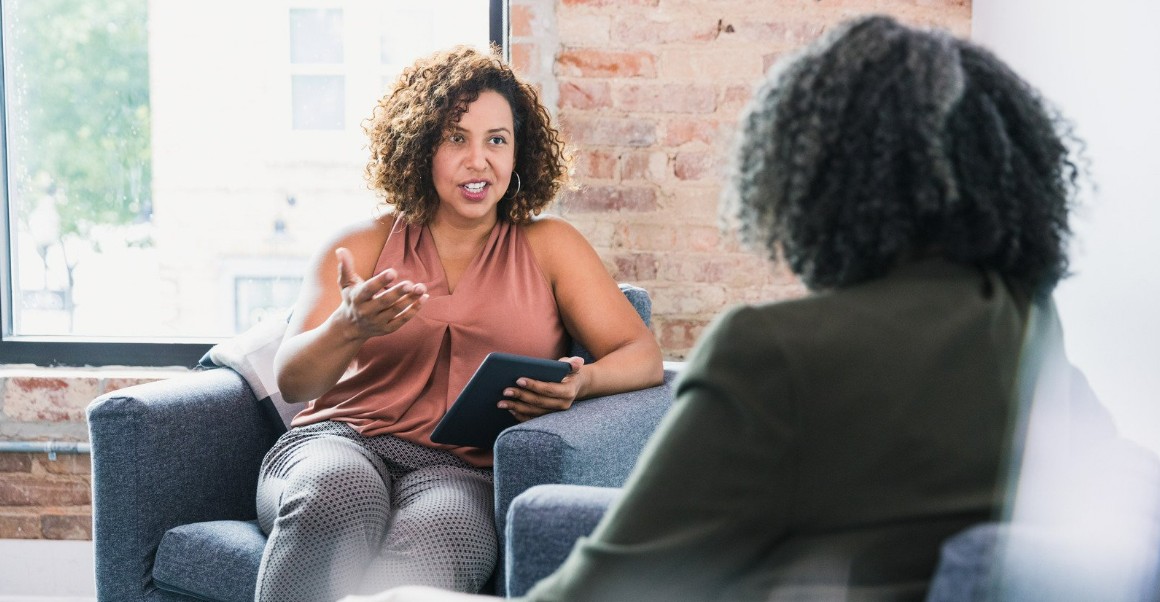 Lady giving a client advice