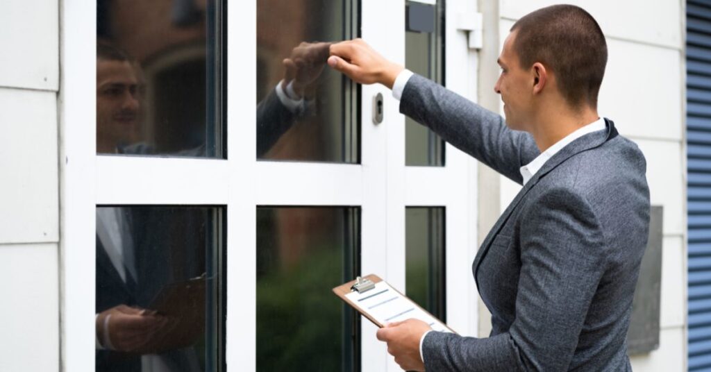 Debt collector knocking on window