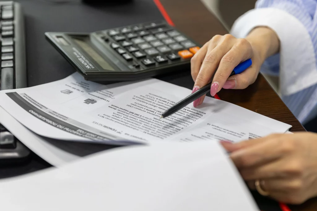 Close up on office worker going through a file